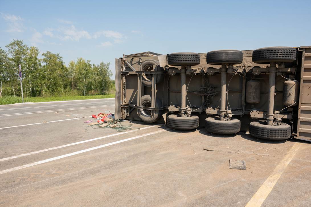 A truck that has been crashed on the side of the road
AI-generated content may be incorrect.